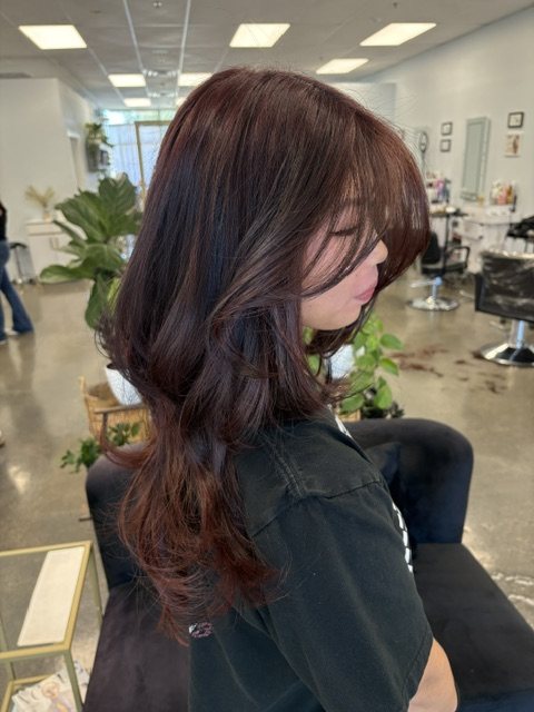 Burgundy toned layers with movement through the ends