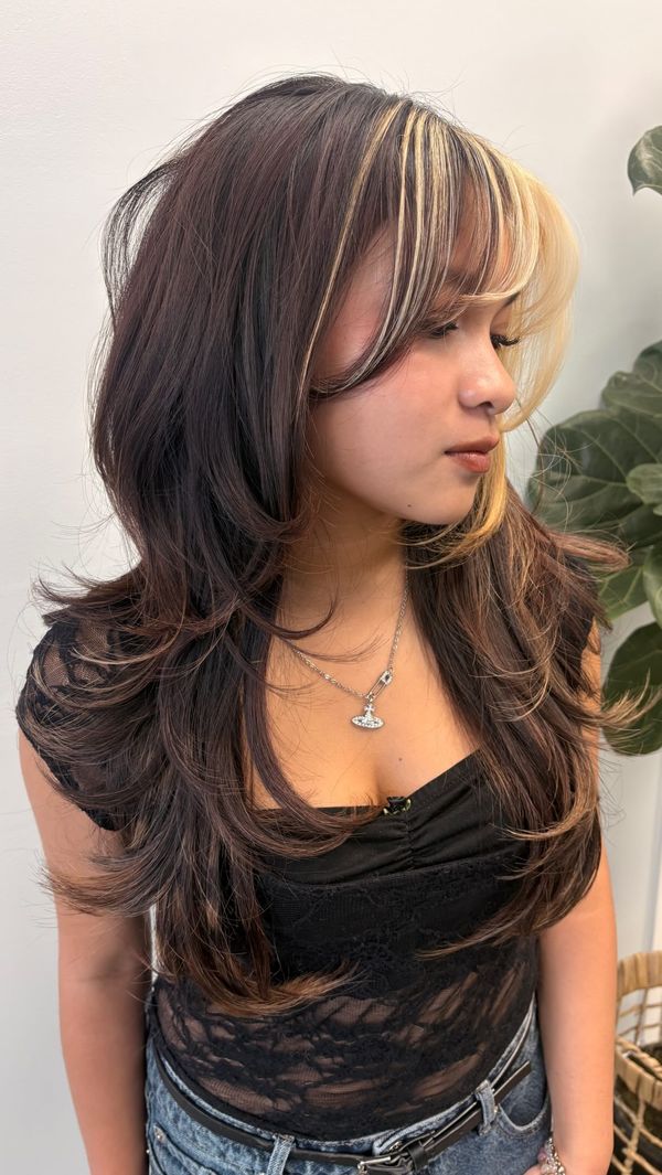 Layered cut with warm copper face framing pieces