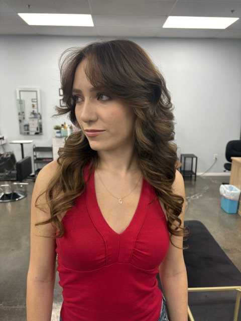 Extensions blended into brunette layers for volume
